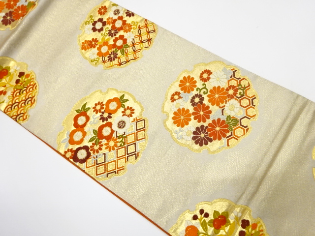 雪輪に花模様織り出し　袋帯